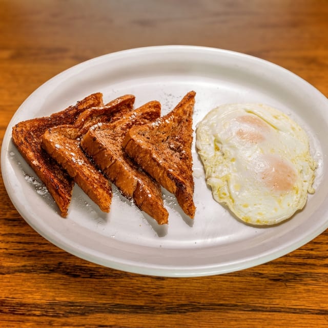 2 French Toast with Eggs.